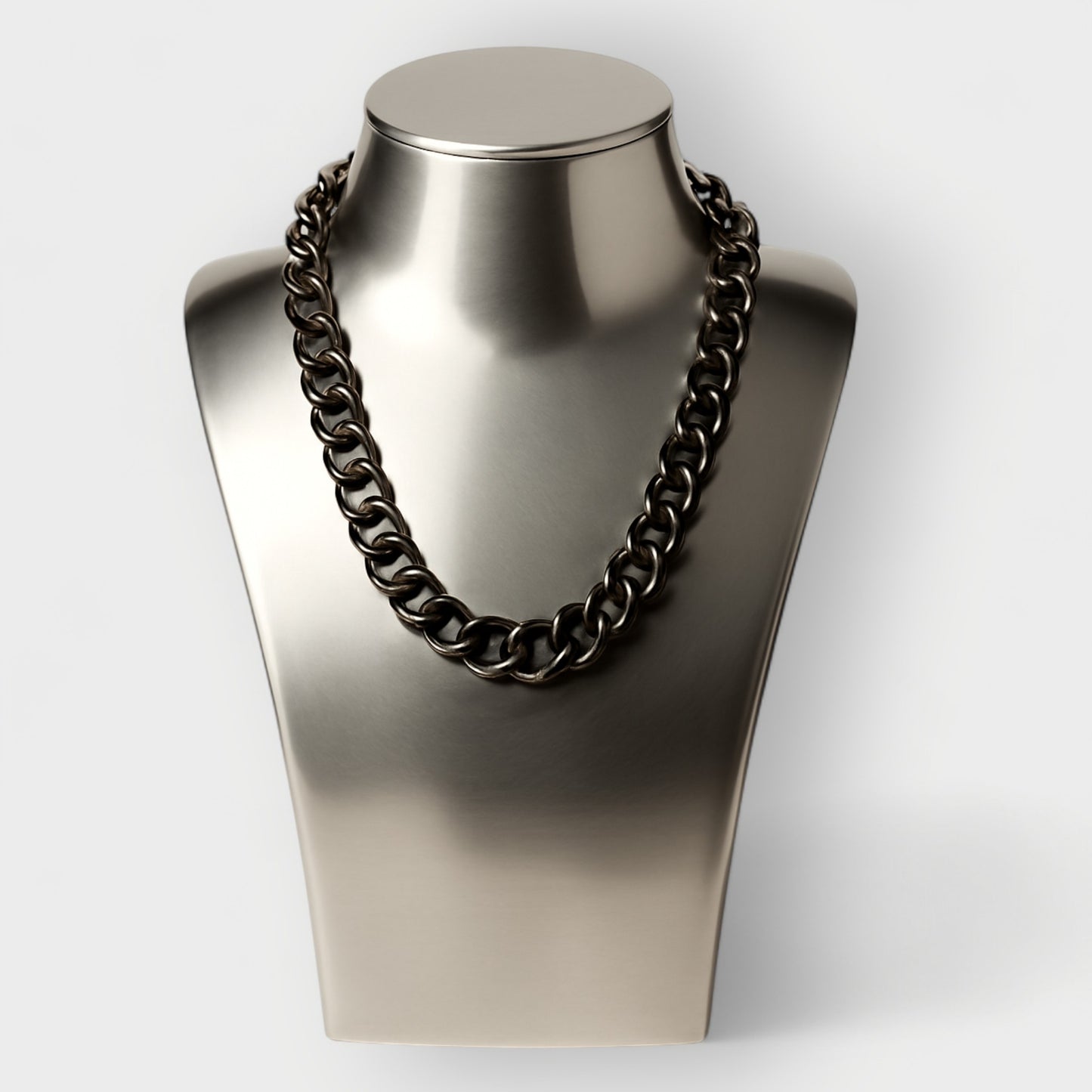 Black Aluminium Chain necklace on a metallic mannequin bust against a white background