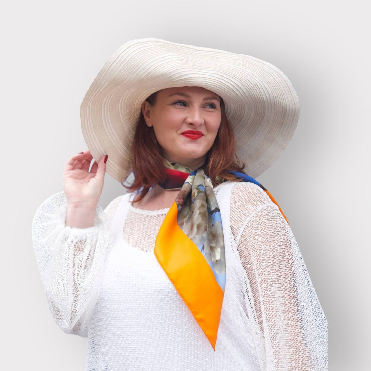 Silk scarf with Orange Bird of Paradise and White Blue Cherry Blossom print, styled around model's neck over the Aphrodite White Holiday Dress for a chic relaxed look.White Background.