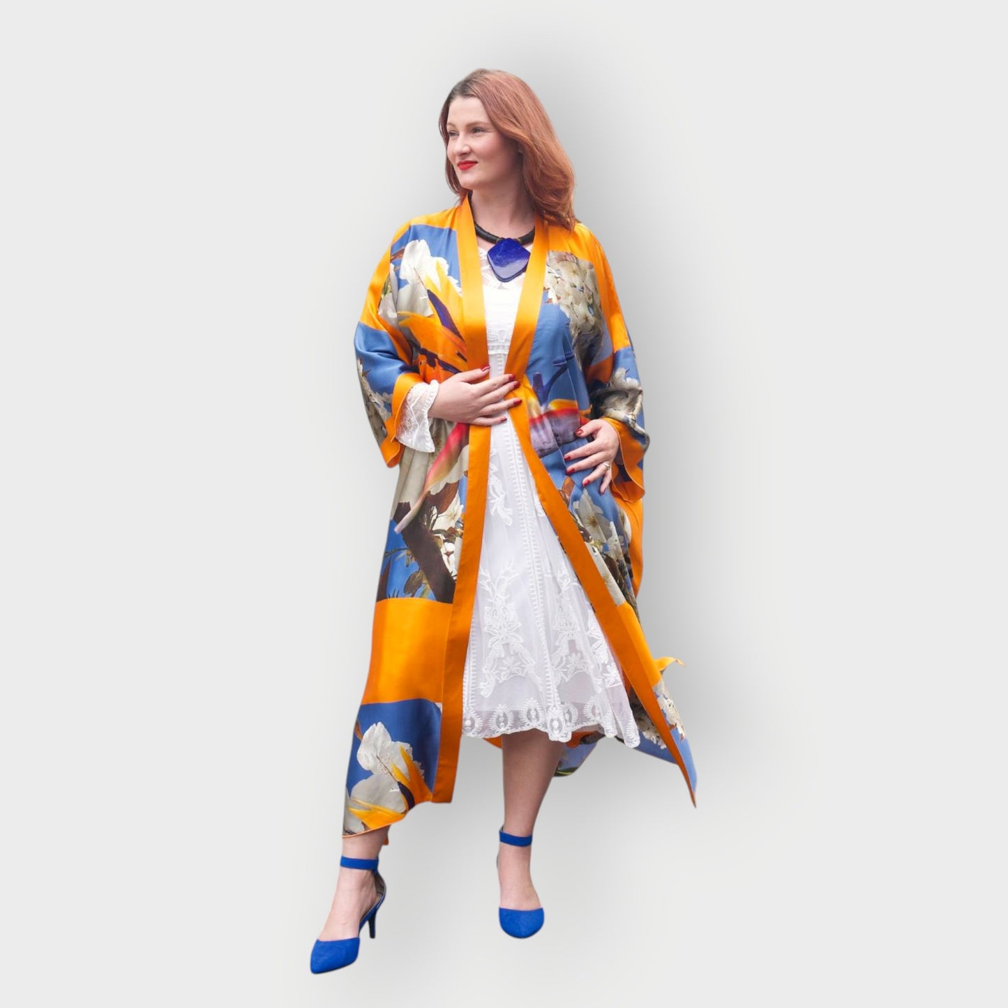 Bird of Paradise Cherry Blossom Silk Kimono styled with Lapis Lazulis Jewelry by Veronique Designs, showcasing a luxurious and elegant ensemble.