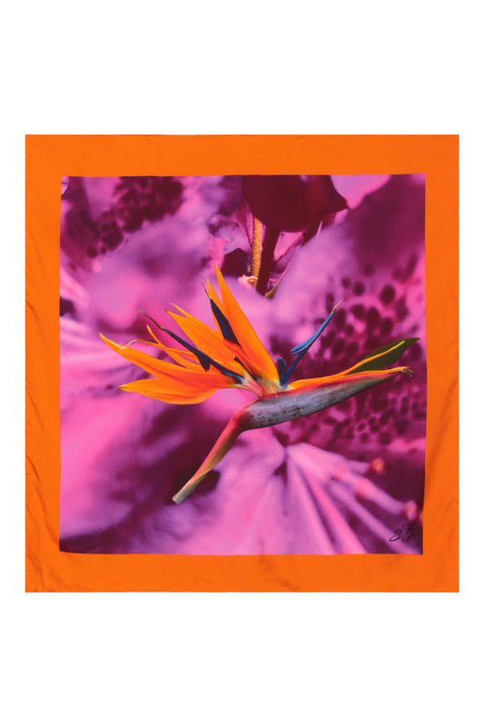 Silk scarf featuring an Orange Bird of Paradise with a Pink and Purple print, displayed as a flat lay to showcase its vibrant design.