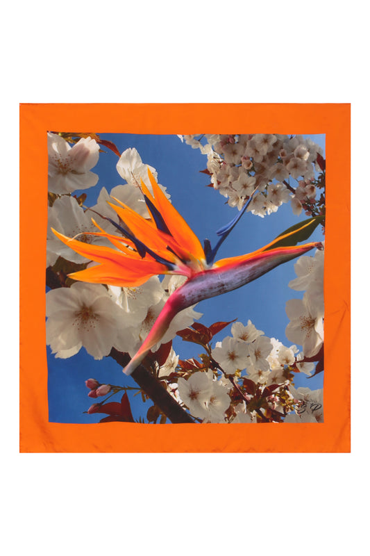 Silk scarf featuring an Orange Bird of Paradise with a White and Blue Cherry Blossom print, displayed as a flat lay to showcase its vibrant design.