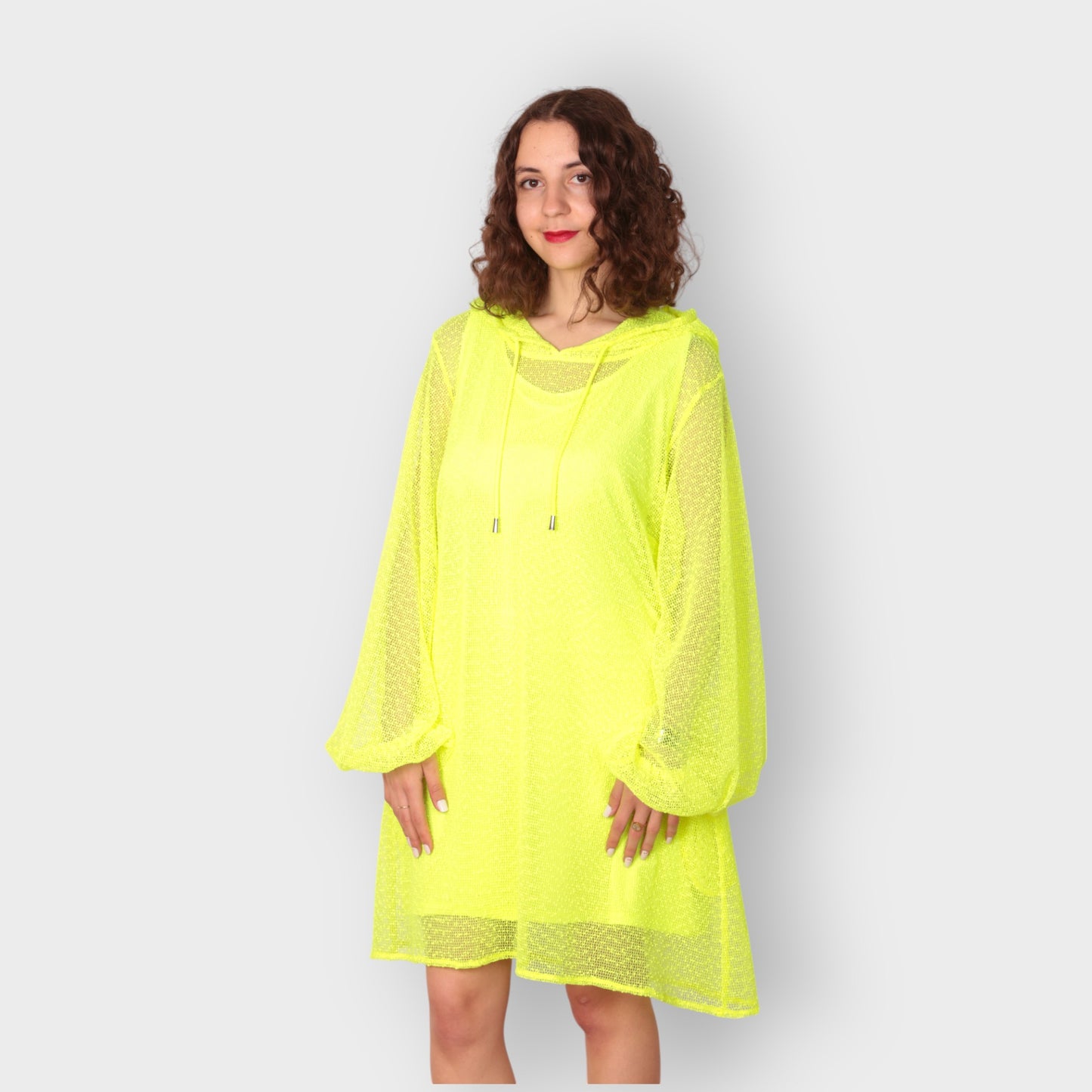 Women wearing a Plus Size Aphrodite Neon Lime Holiday Resort Dress with matching neon lime undergarment and hoodie. Straight cut short version photogrpahed from the front.