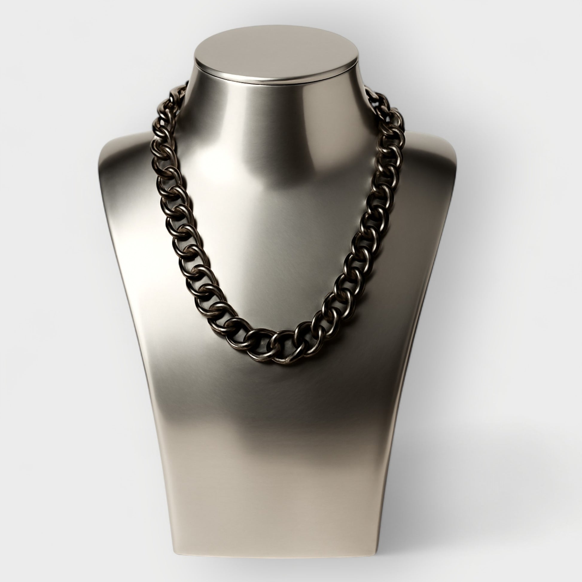 Black Aluminium Chain necklace on a metallic mannequin bust against a white background