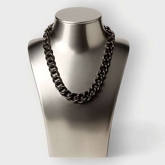 Black Aluminium Chain necklace on a metallic mannequin bust against a white background