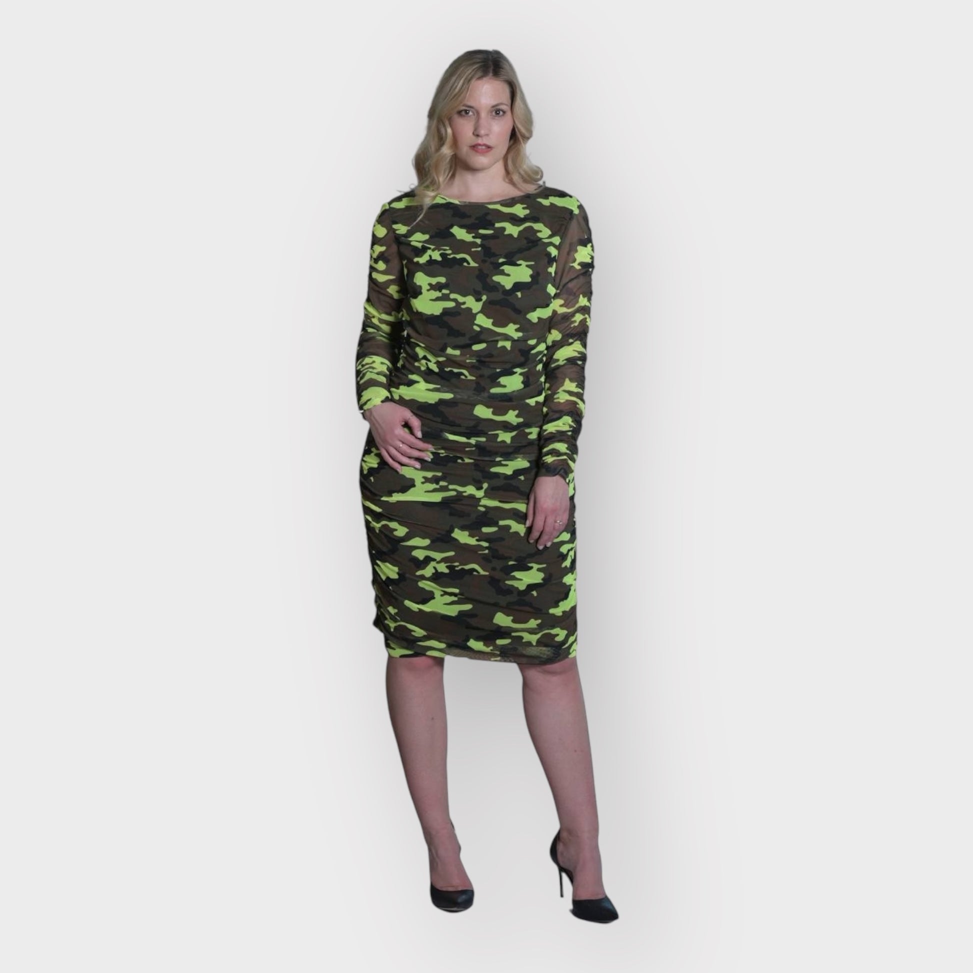Women's Mid Size Neon Lime Brown Black Camouflage Bodycon Midi Dress styled with black heels for a bold and chic look.