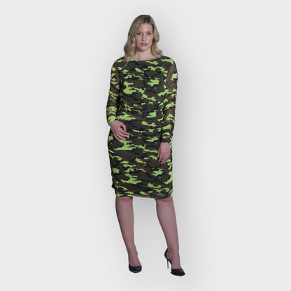 Women's Mid Size Neon Lime Brown Black Camouflage Bodycon Midi Dress styled with black heels for a bold and chic look.