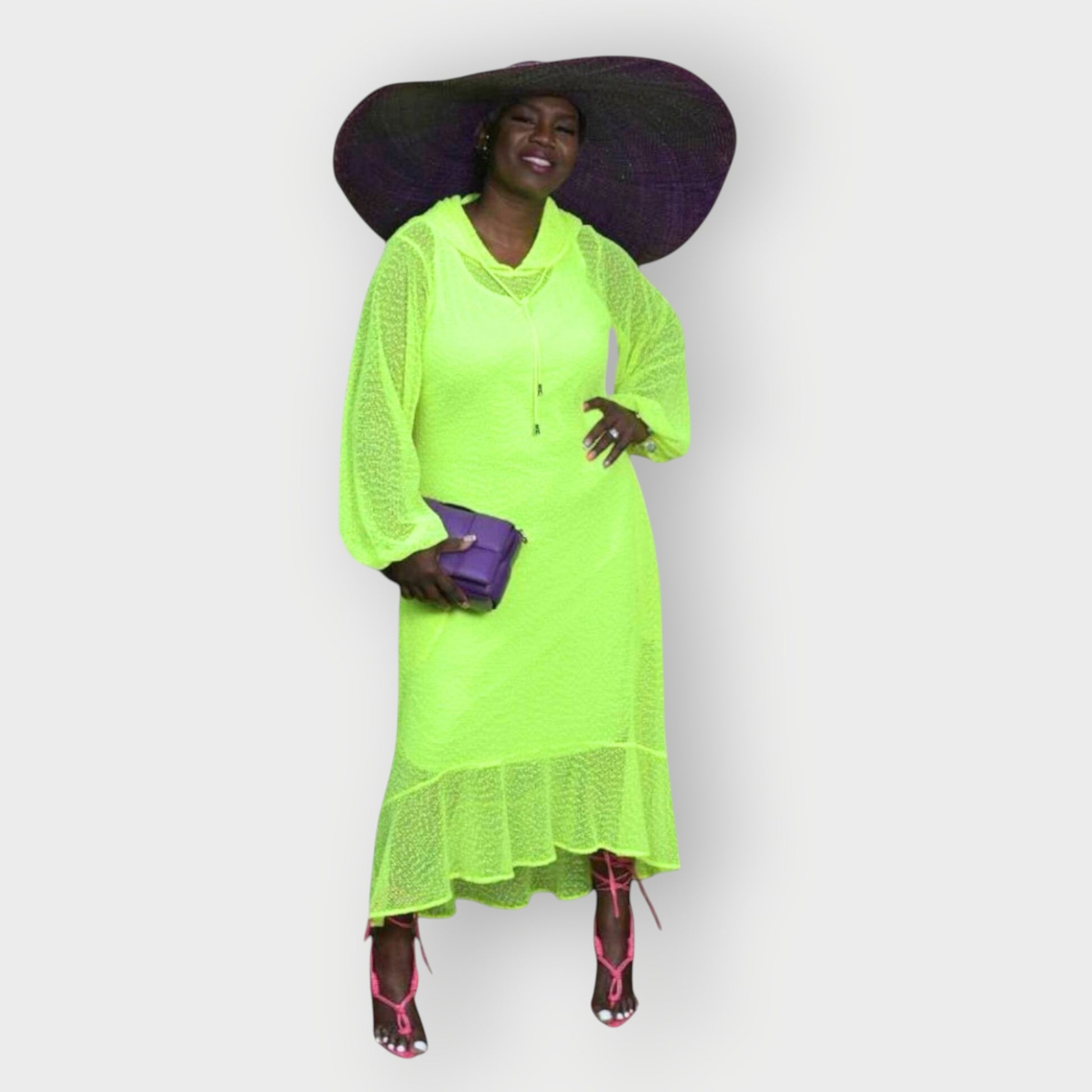 Women's Plus Size Aphrodite Neon Lime Holiday Resort Dress with matching neon lime undergarment, styled with a purple sunhat, handbag, and pink heels.