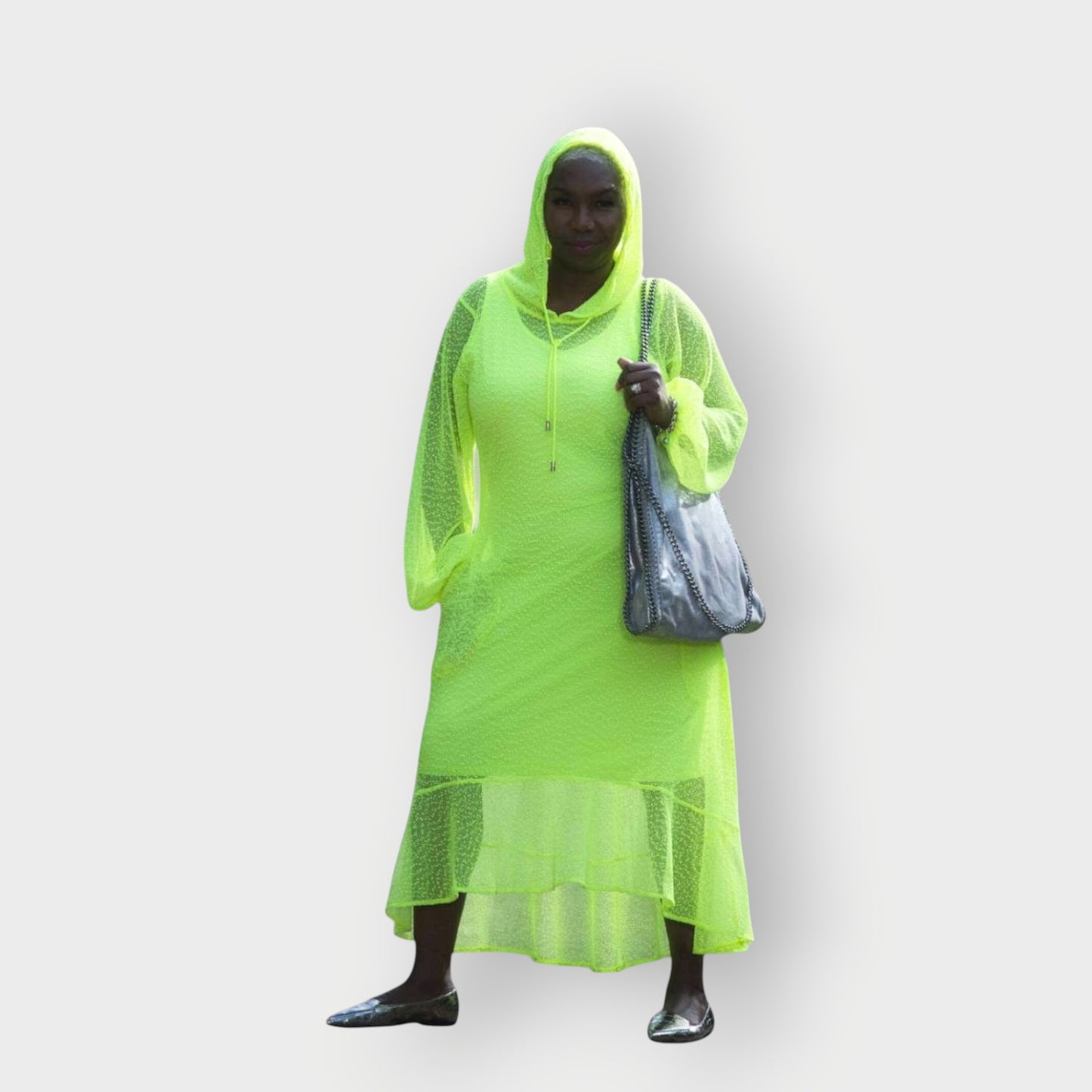 Women's Aphrodite Neon Lime Holiday Resort Dress with hoodie and matching neon lime undergarment, styled with a silver  handbag and silver flats.
