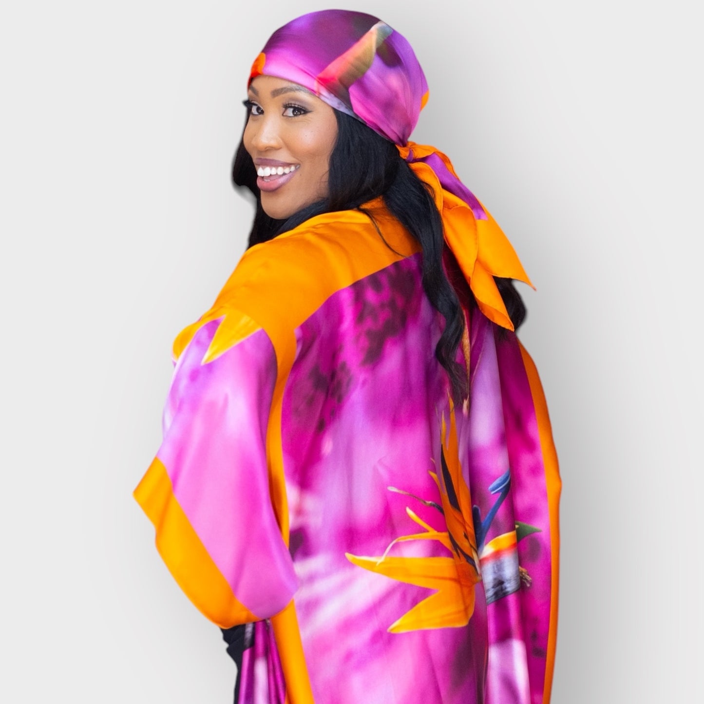 Women's Bird of Paradise Pink Purple Silk Kimono paired with a matching Pink Purple Silk Scarf styled as a headscarf for a coordinated look.
