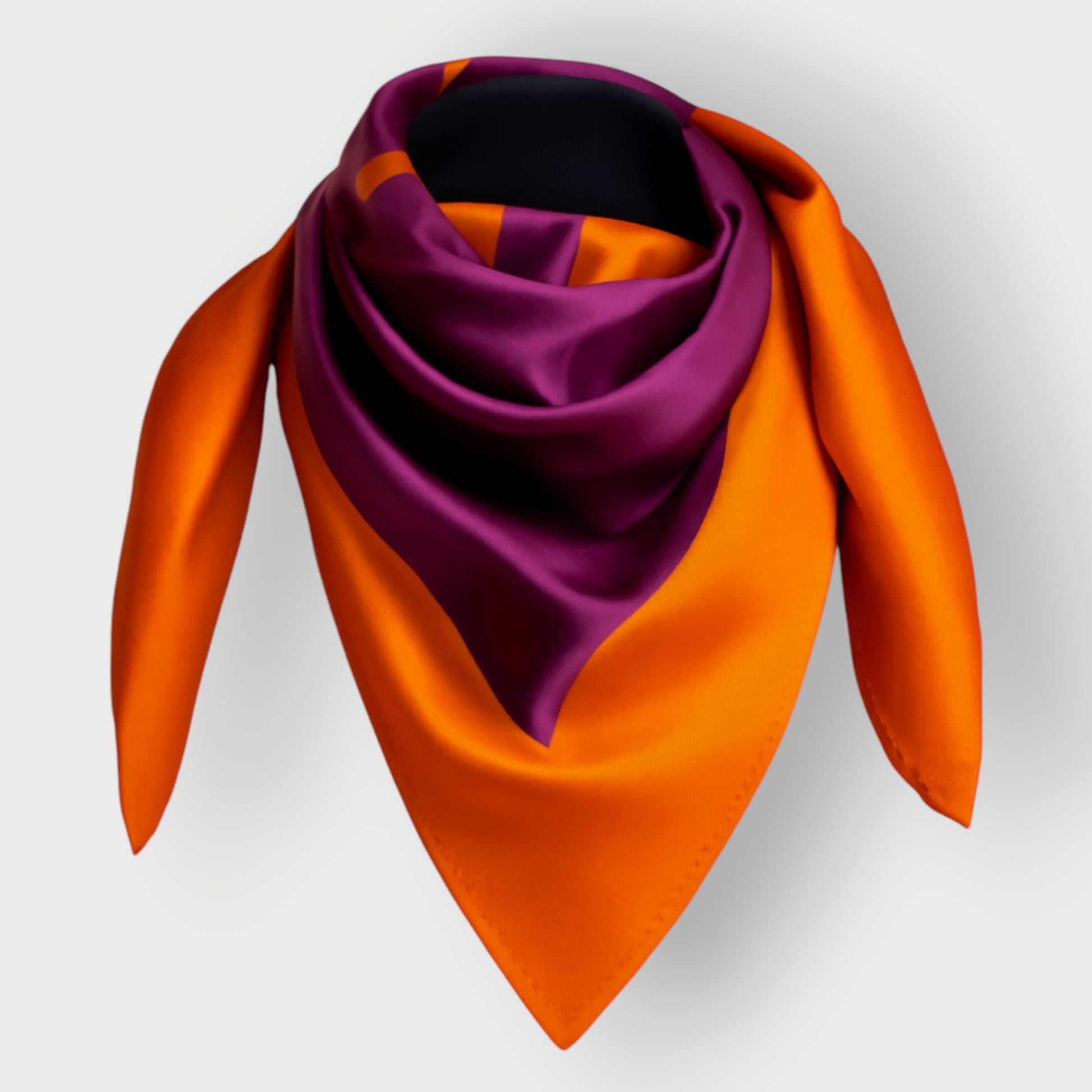 Womens Luxury Silk scarf featuring an Orange Bird of Paradise with a pink and purple print, displayed as a cutout on an invisible mannequin.