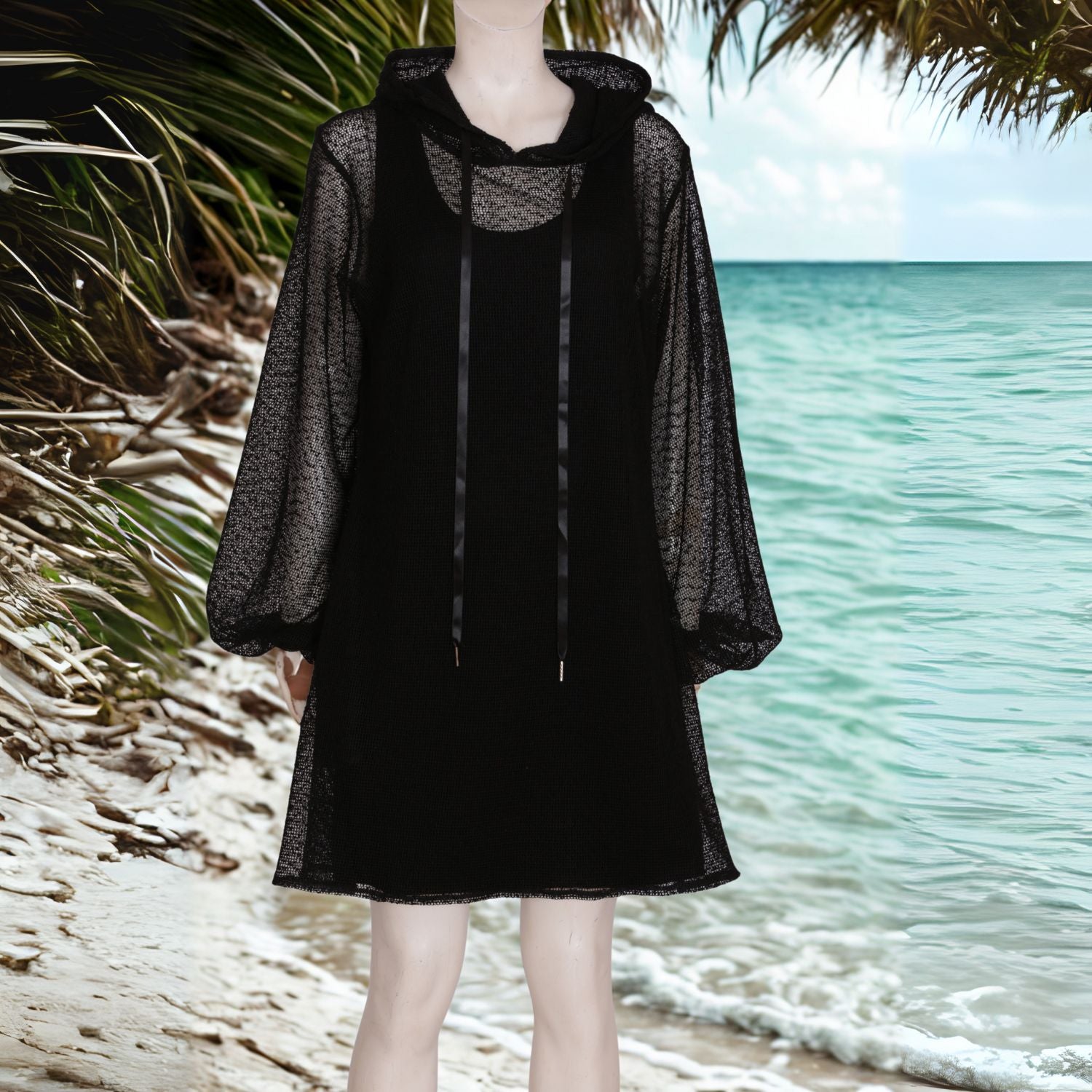 Plus Size Aphrodite Black Holiday Resort Dress with matching black undergarment and hoodie on mannequin. Short Version . On the beach at the Seychelles