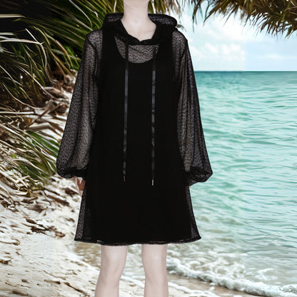 Plus Size Aphrodite Black Holiday Resort Dress with matching black undergarment and hoodie on mannequin. Short Version . On the beach at the Seychelles