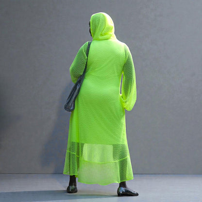 Women's Plus Size Aphrodite Neon Lime Holiday Resort Dress with hoodie and matching neon lime undergarment, styled with a silver  handbag and silver flats.