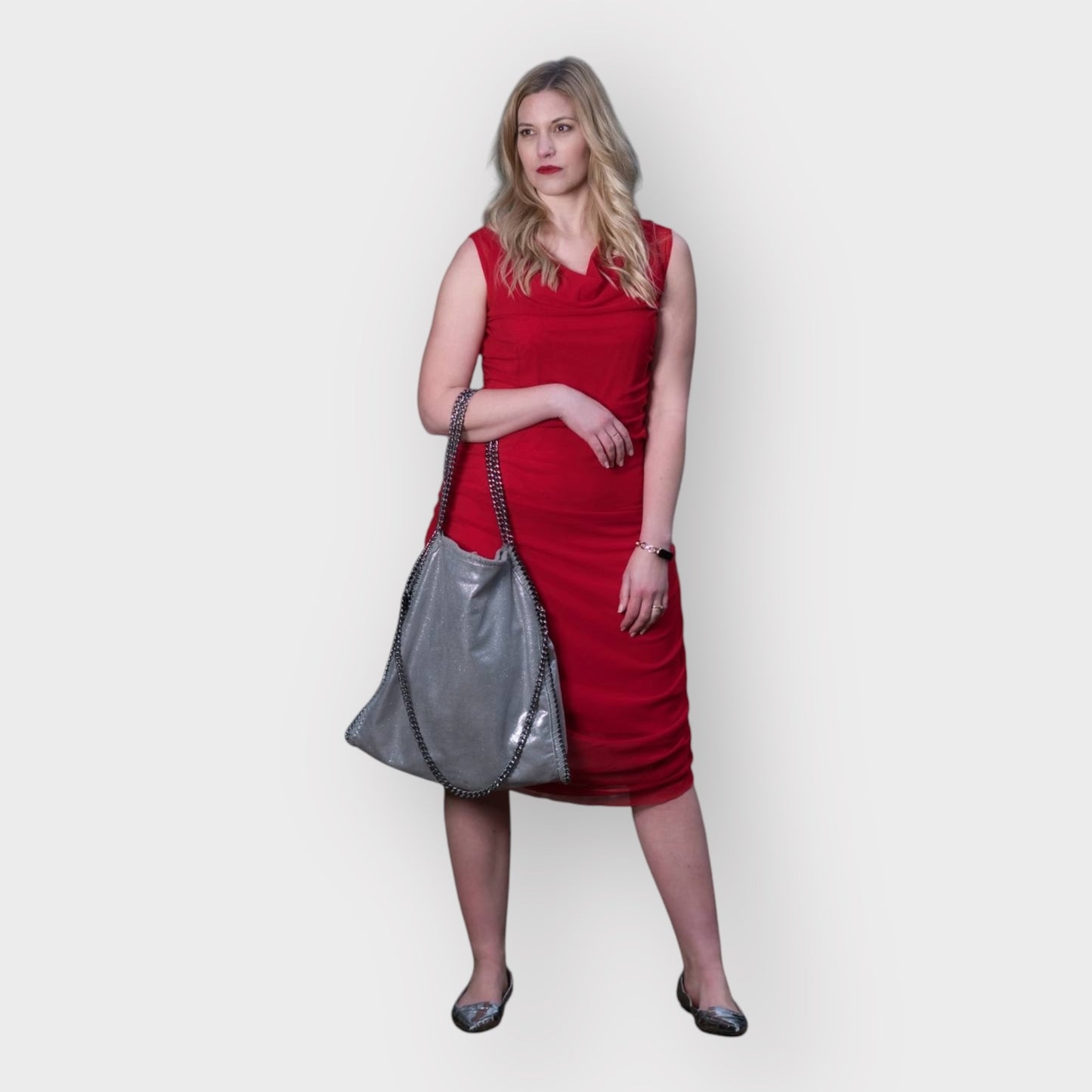 Women's Boudicca Summer Red Ruched Bodycon Midi Dress styled with a silver  handbag and Silver flats for a chic, modern ensemble.