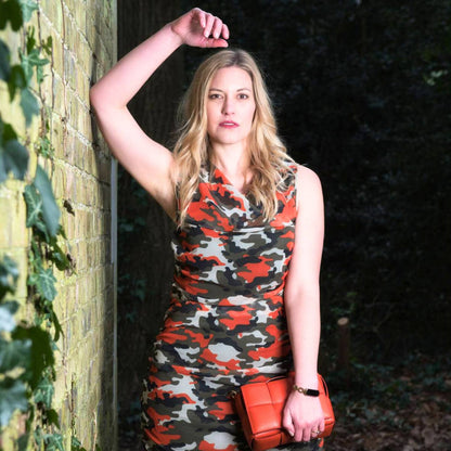 Women's Summer Mid Size Orange Green Grey Camouflage Bodycon Midi Dress styled with an orange handbag a for a bright, stylish look.