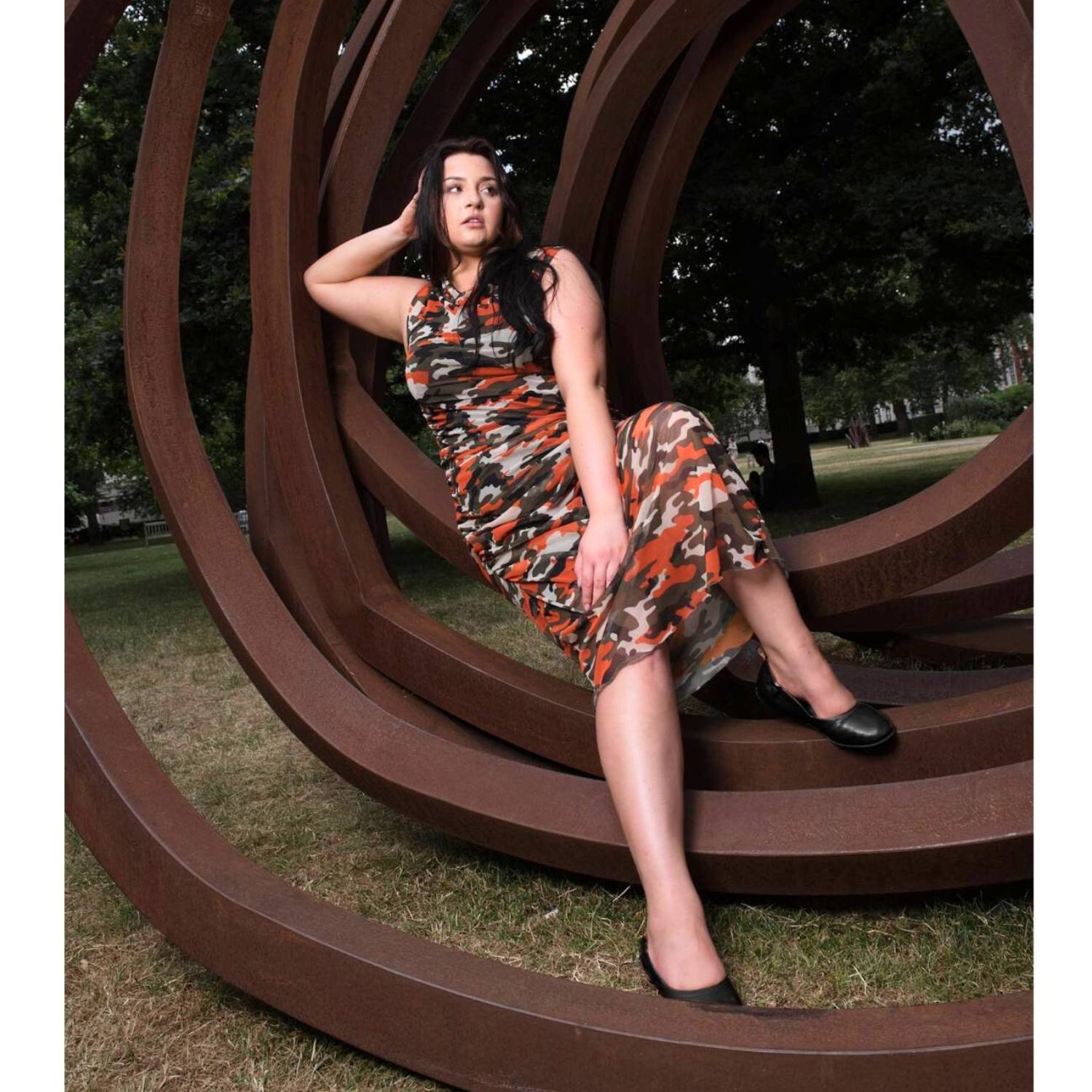 Women's Summer Plus Size Orange Green Grey Camouflage Bodycon Midi Dress styled with black flats for a modern, stylish look.