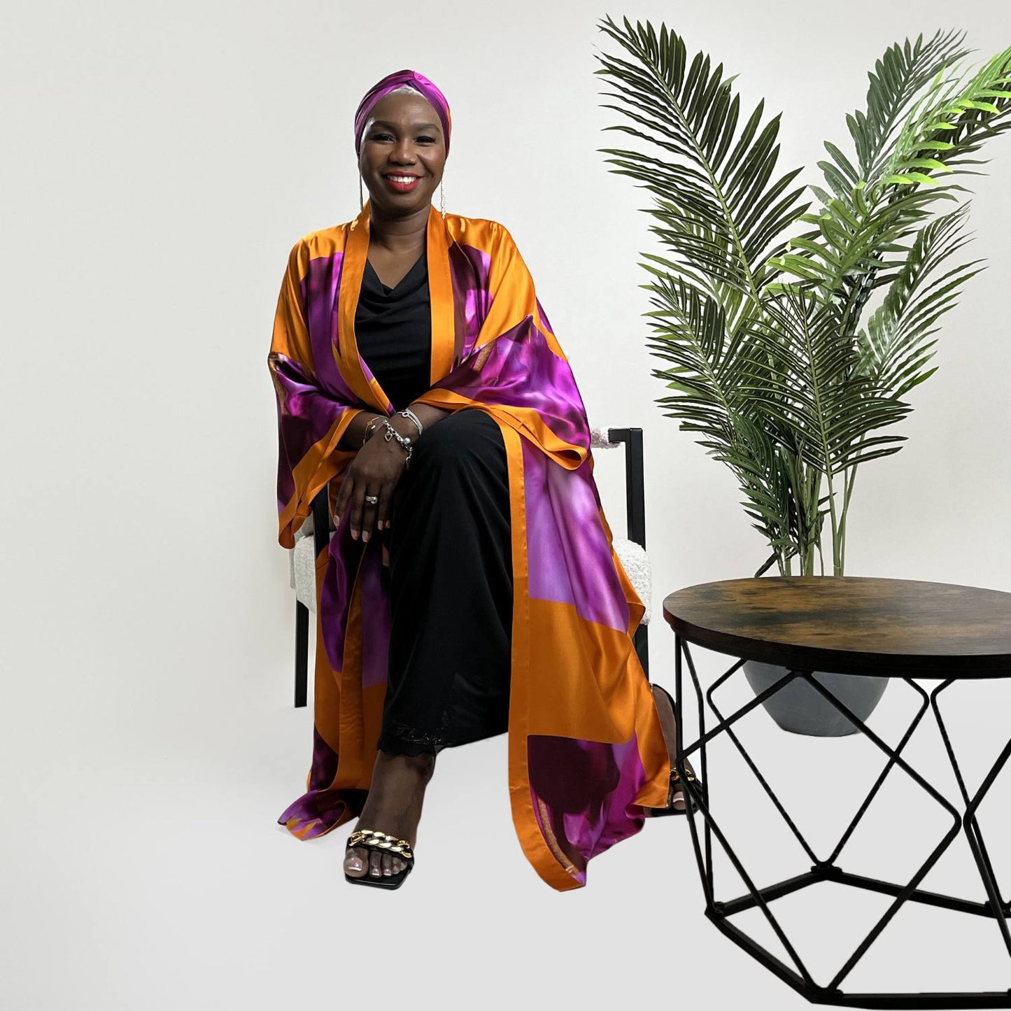Women's Bird of Paradise Pink Purple Silk Kimono styled with the Boudicca Black Ruched Dress and a matching Pink Purple Silk Scarf as a headscarf for a cohesive look.