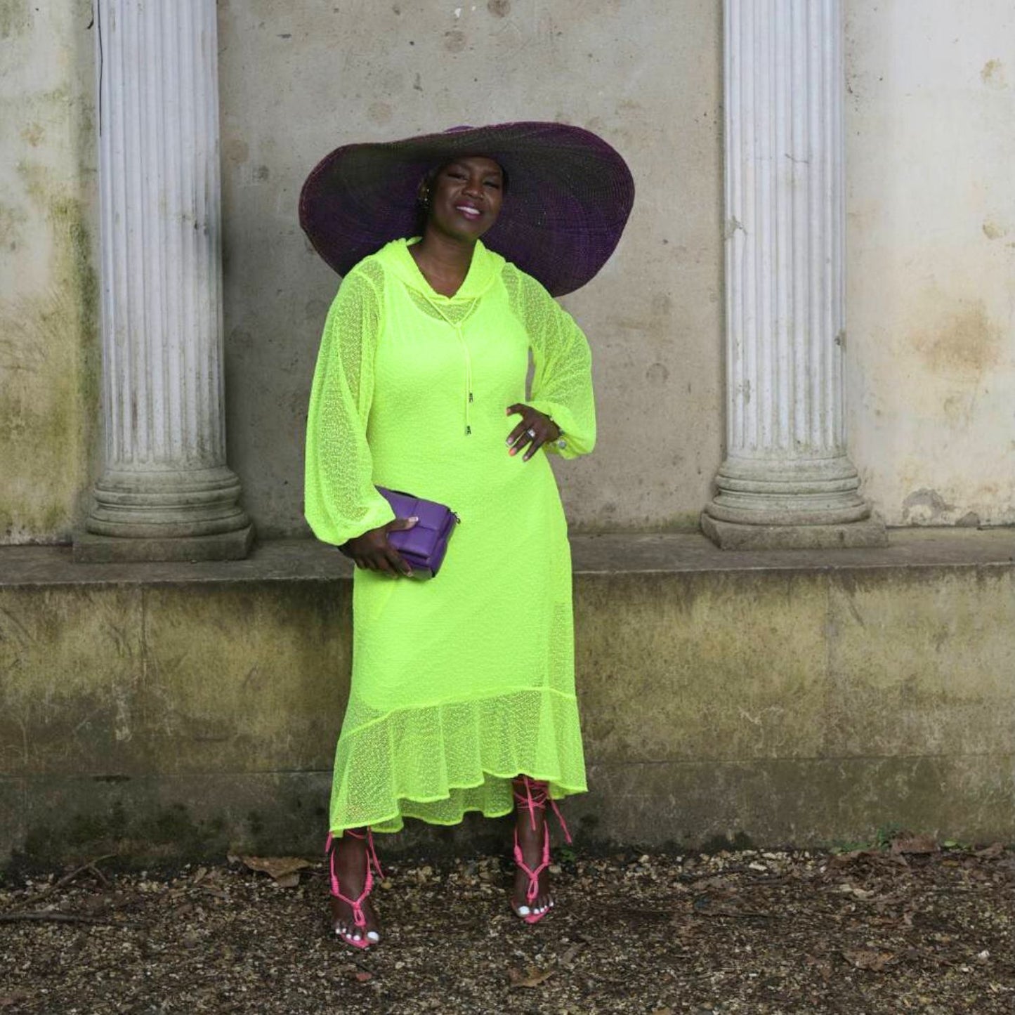 Women's Plus Size Aphrodite Neon Lime Holiday Resort Dress with matching neon lime undergarment, styled with a purple sunhat, handbag, and pink heels.