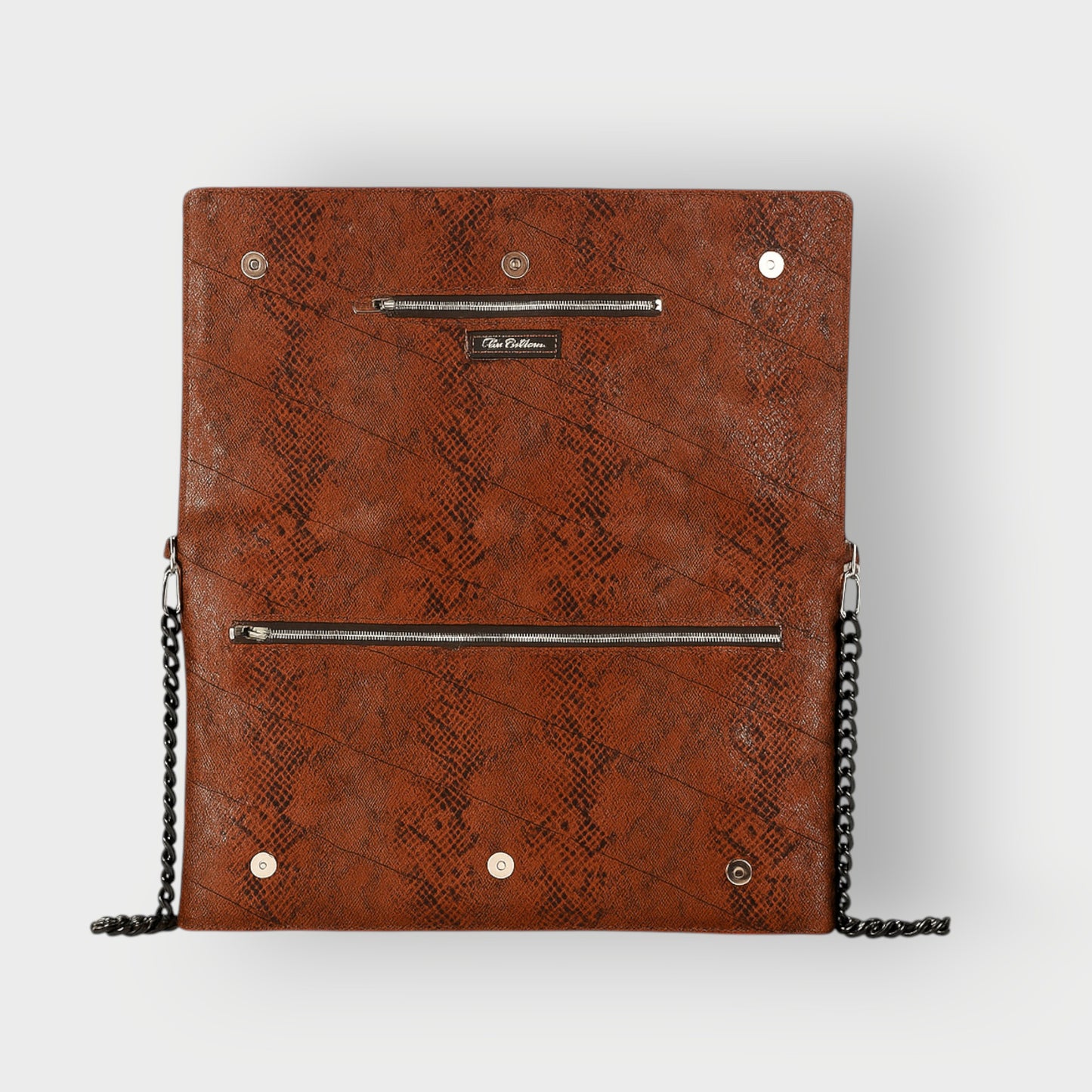 Chocolate Brown textured clutch bag with black chain handle on a light gray background