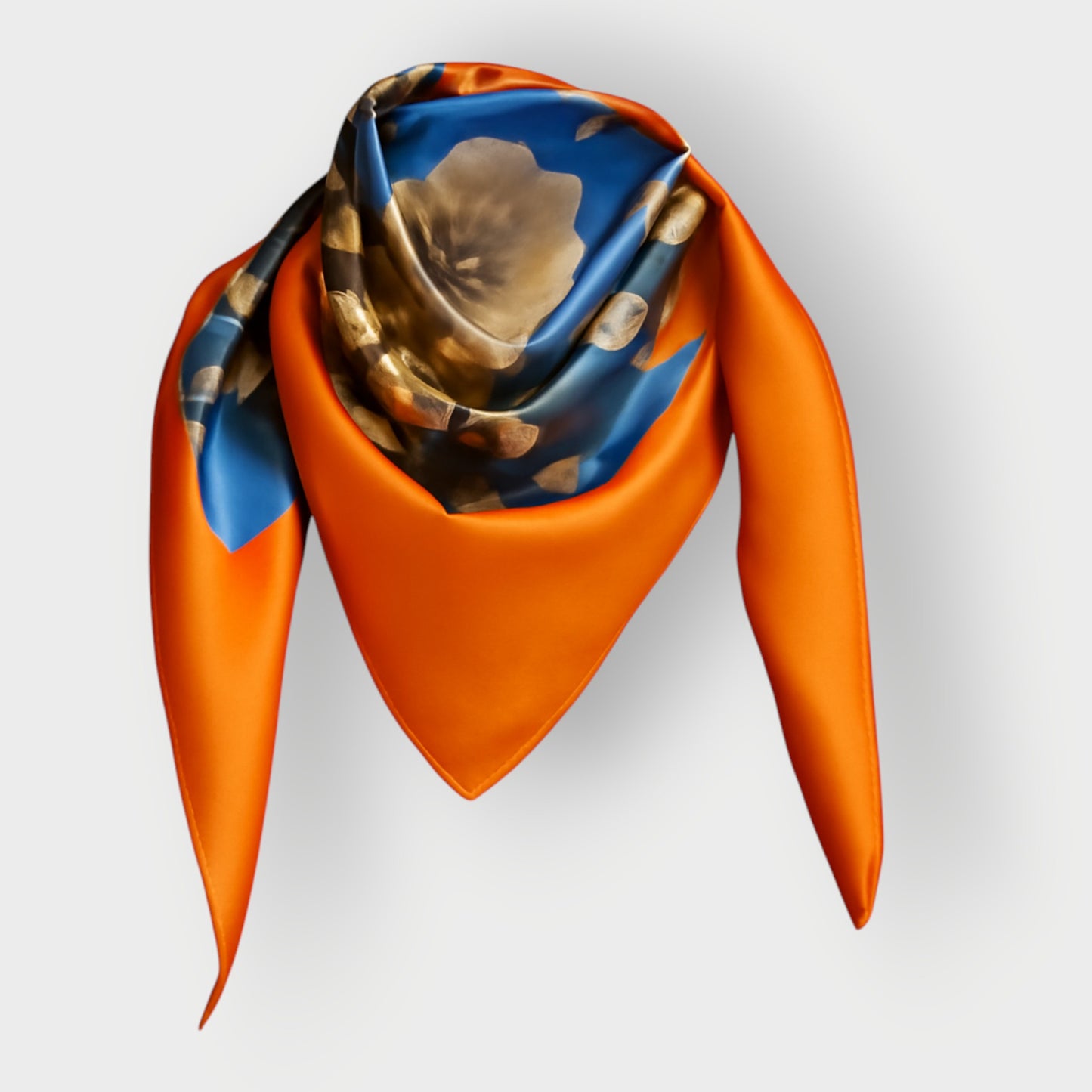 Silk scarf with Orange Bird of Paradise and White-Blue Cherry Blossom print, displayed as a cutout around an invisible mannequin's neck to highlight its intricate design.